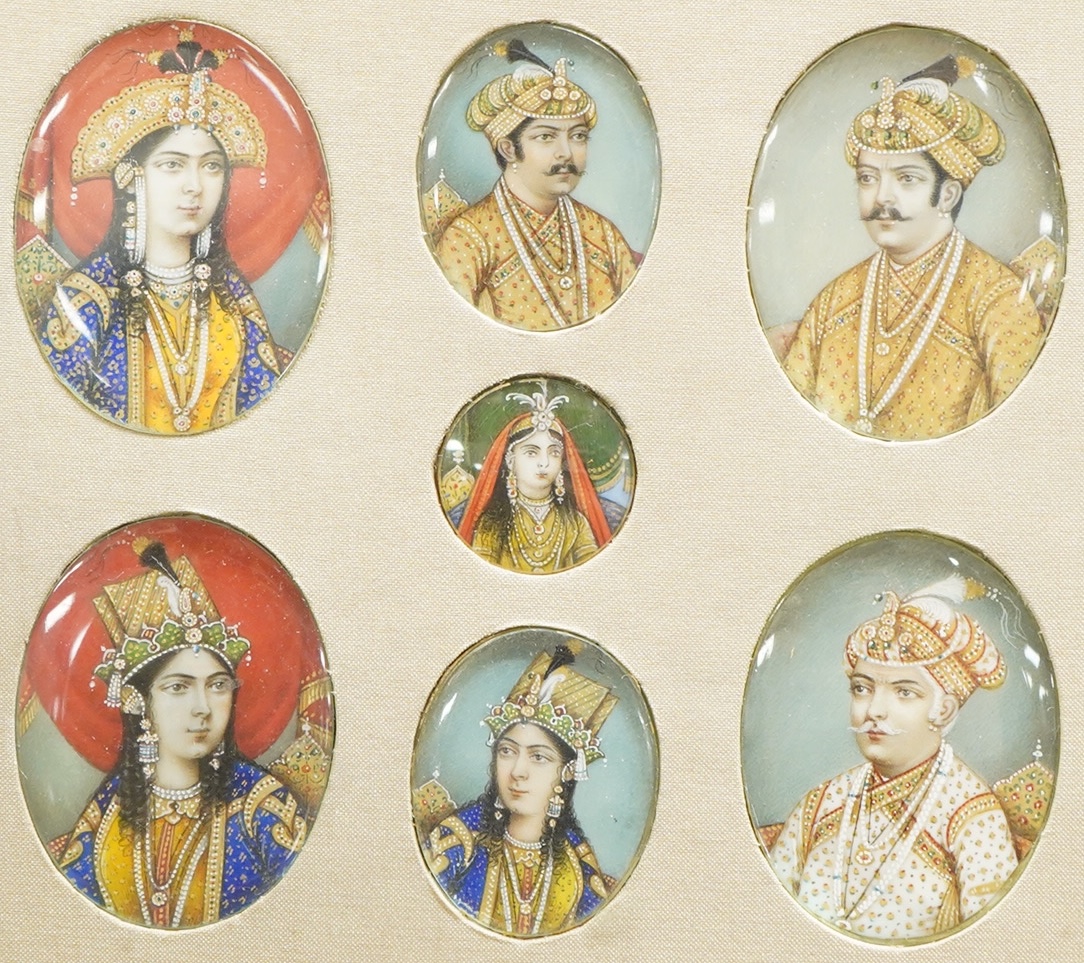 Indian School, 19th century, a set of seven family portrait miniatures, oils on ivory, mounted and framed as one, largest miniature 5 x 3.5cm CITES Submission reference, NGUHCSRQ